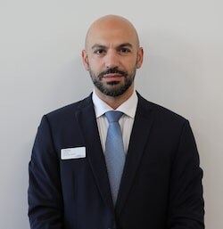 Staff member Christos Pesirides from ID_d3dc19