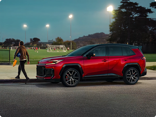  Plug-in Hybrid GR SPORT shown in Supersonic Red with Midnight Black Metallic roof. Prototype shown. Plug-in Hybrid available spring 2026.