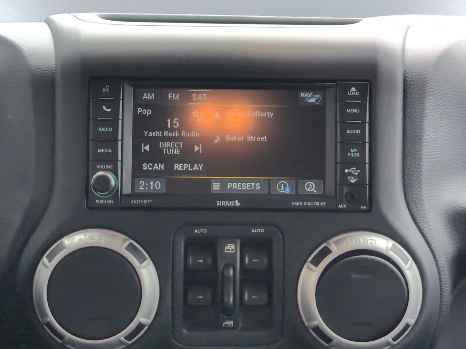 used 2015 Jeep Wrangler Unlimited car, priced at $18,498