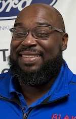 Staff member Mark Waters from ID_438415