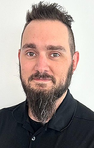 Staff member Kyle King from ID_143890