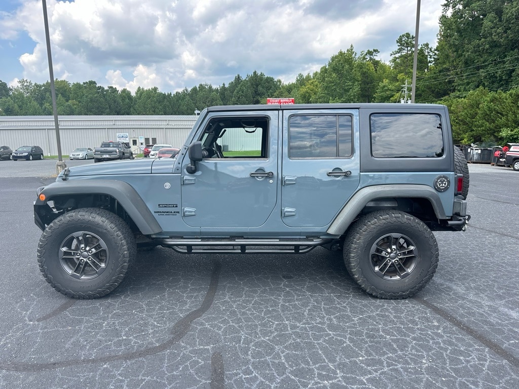 Used 2014 Jeep Wrangler Unlimited Sport with VIN 1C4BJWDG8EL156583 for sale in Asheboro, NC