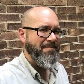 Staff member Jason Wicks from 5b6a8f408828