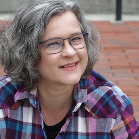 Staff member Delina Hensley from 4316c1384fa7