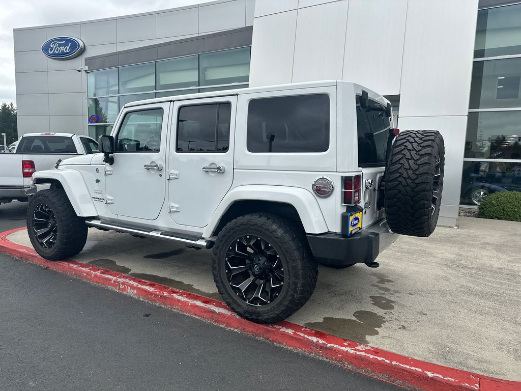 Used 2014 Jeep Wrangler Unlimited Sahara with VIN 1C4BJWEGXEL173867 for sale in Warrenton, OR