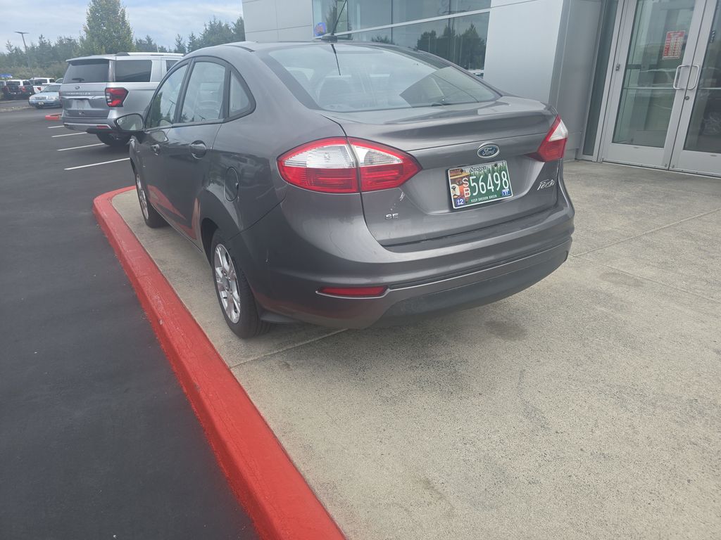 Used 2014 Ford Fiesta SE with VIN 3FADP4BJ3EM139785 for sale in Warrenton, OR
