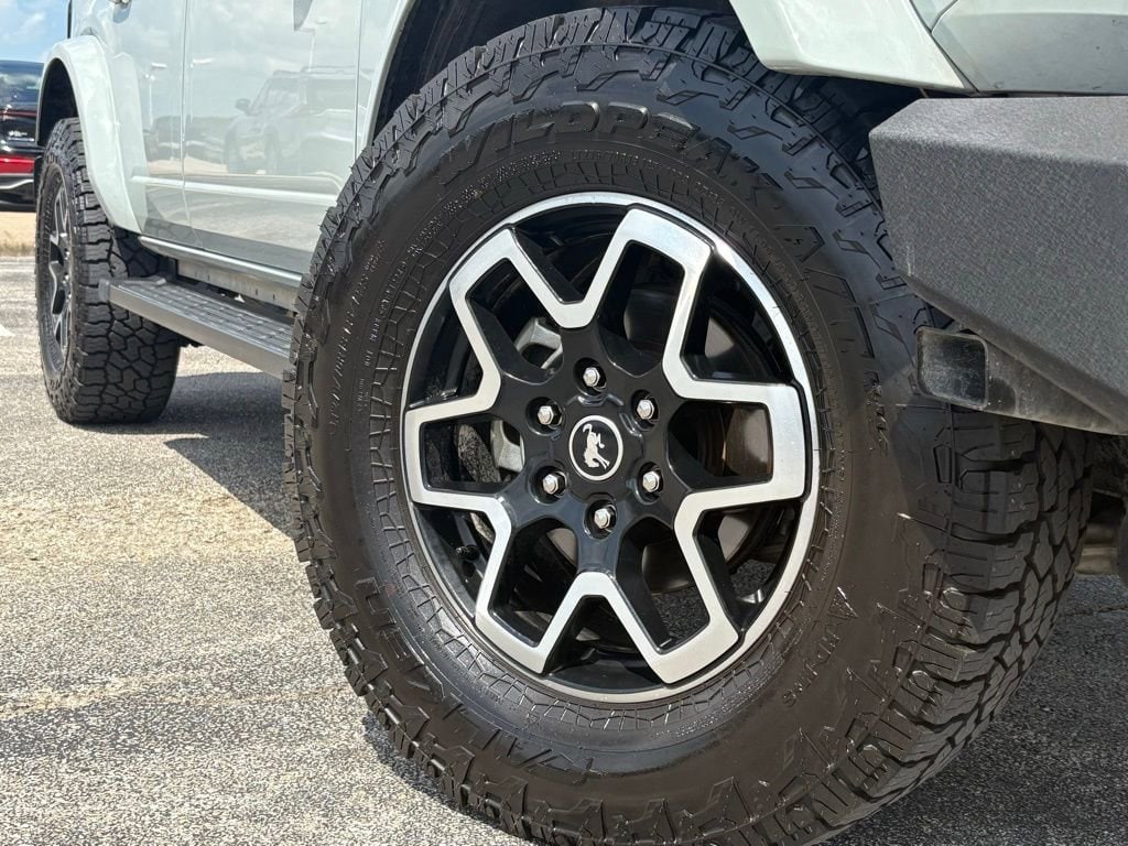 Used 2023 Ford Bronco 4-Door Outer Banks with VIN 1FMEE5BP3PLC00406 for sale in Bryan, TX