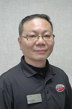 Staff member Dustin Kim from ID_c1a9212eb99f
