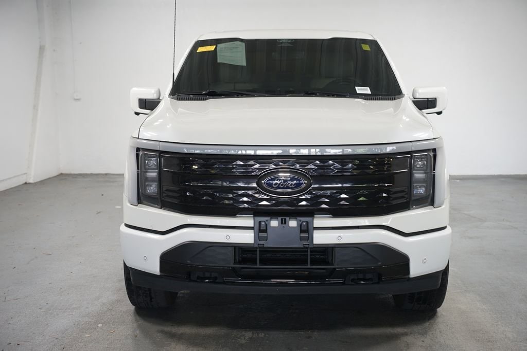 Used 2022 Ford F-150 Lightning Platinum with VIN 1FT6W1EVXNWG02945 for sale in Duluth, GA