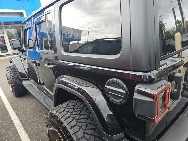 Used 2023 Jeep Wrangler 4-Door Sahara with VIN 1C4HJXEN3PW631653 for sale in Bay Shore, NY