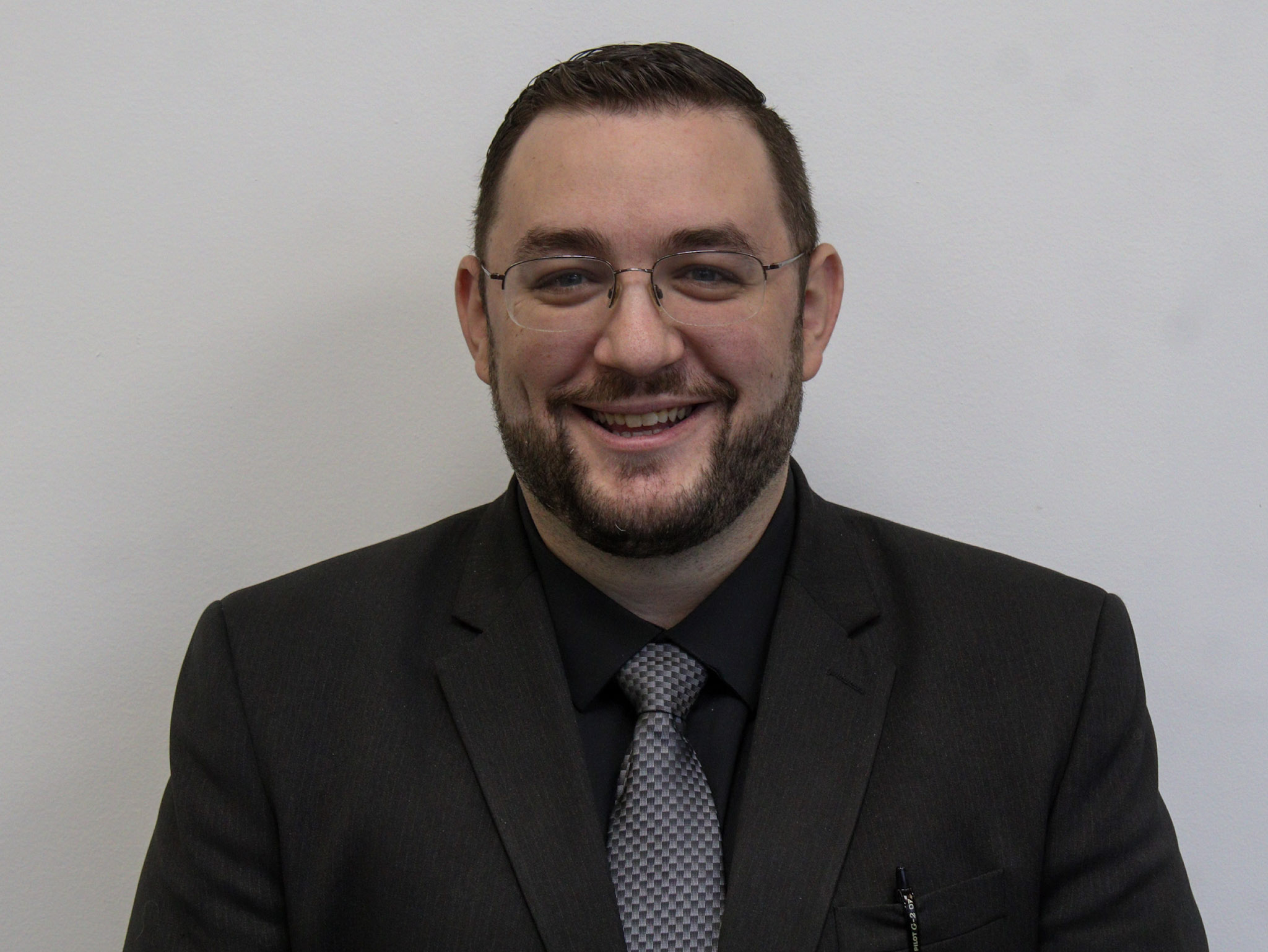 Staff member Russell C. from ID_093d7c