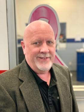 Staff member John Casey from 758b94a7bb6d