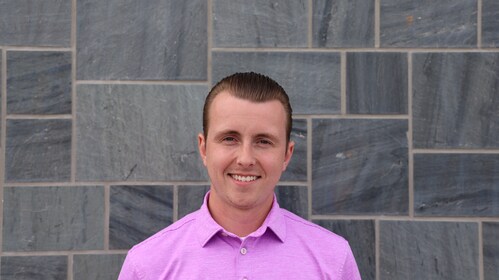 Staff member Yanni Rigas from ID_05909b76f5ce