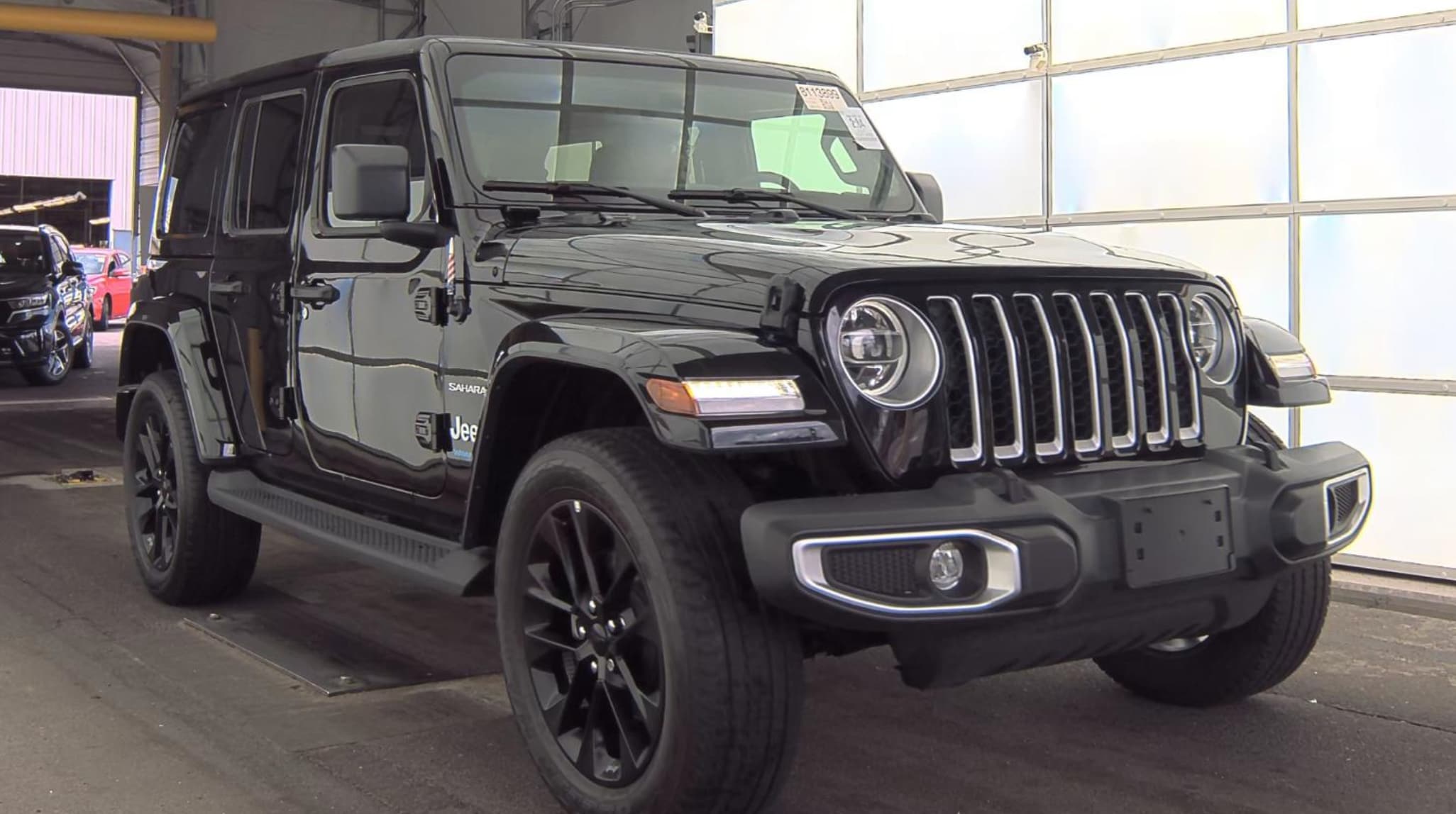 Used 2021 Jeep Wrangler Unlimited Sahara 4XE with VIN 1C4JJXP63MW682573 for sale in Bourne, MA
