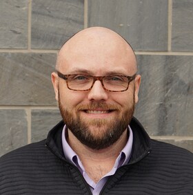 Staff member John Lucey from ID_0c3520296e13