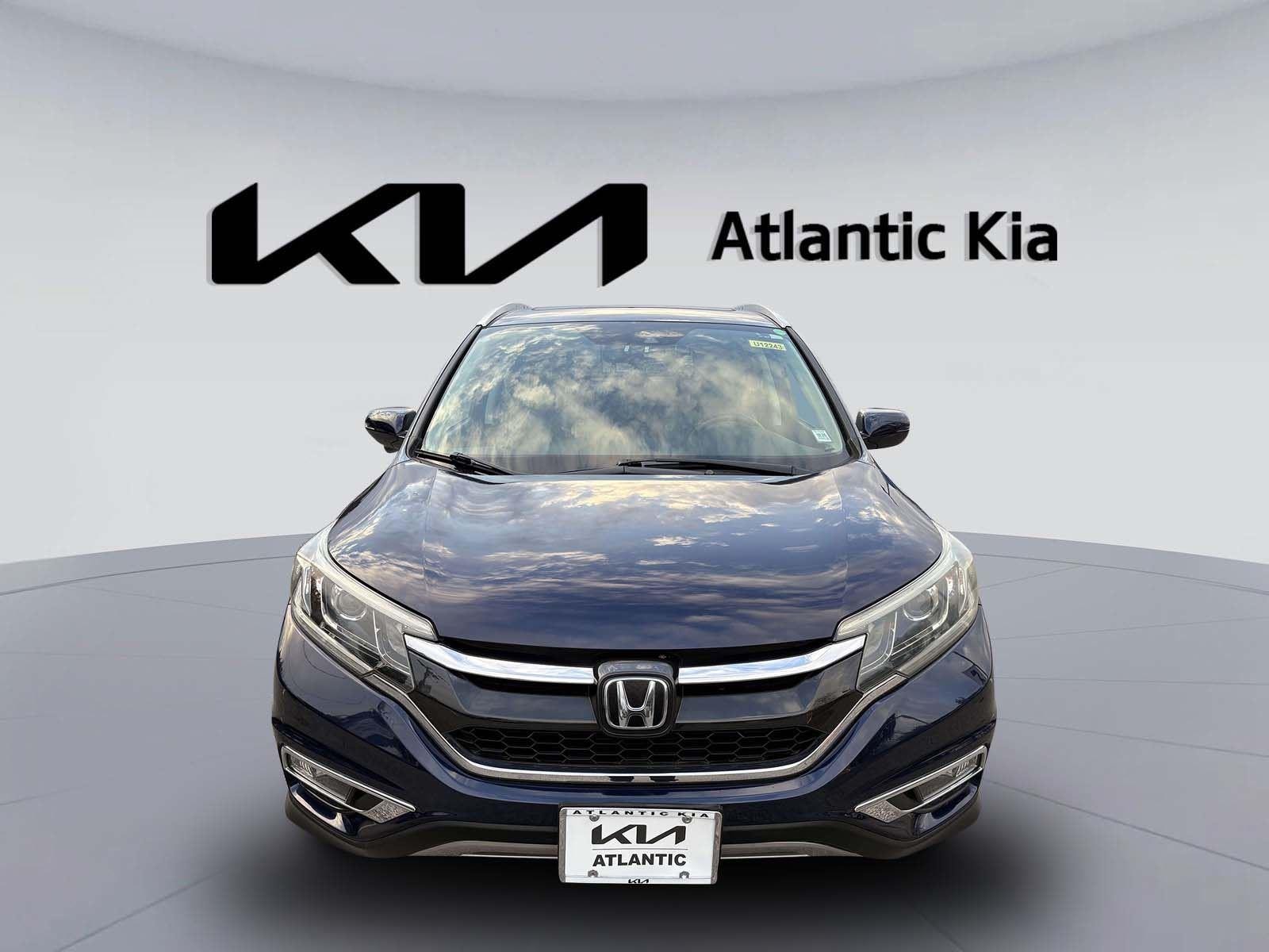 Used 2016 Honda CR-V Touring with VIN 5J6RM4H91GL126506 for sale in West Islip, NY