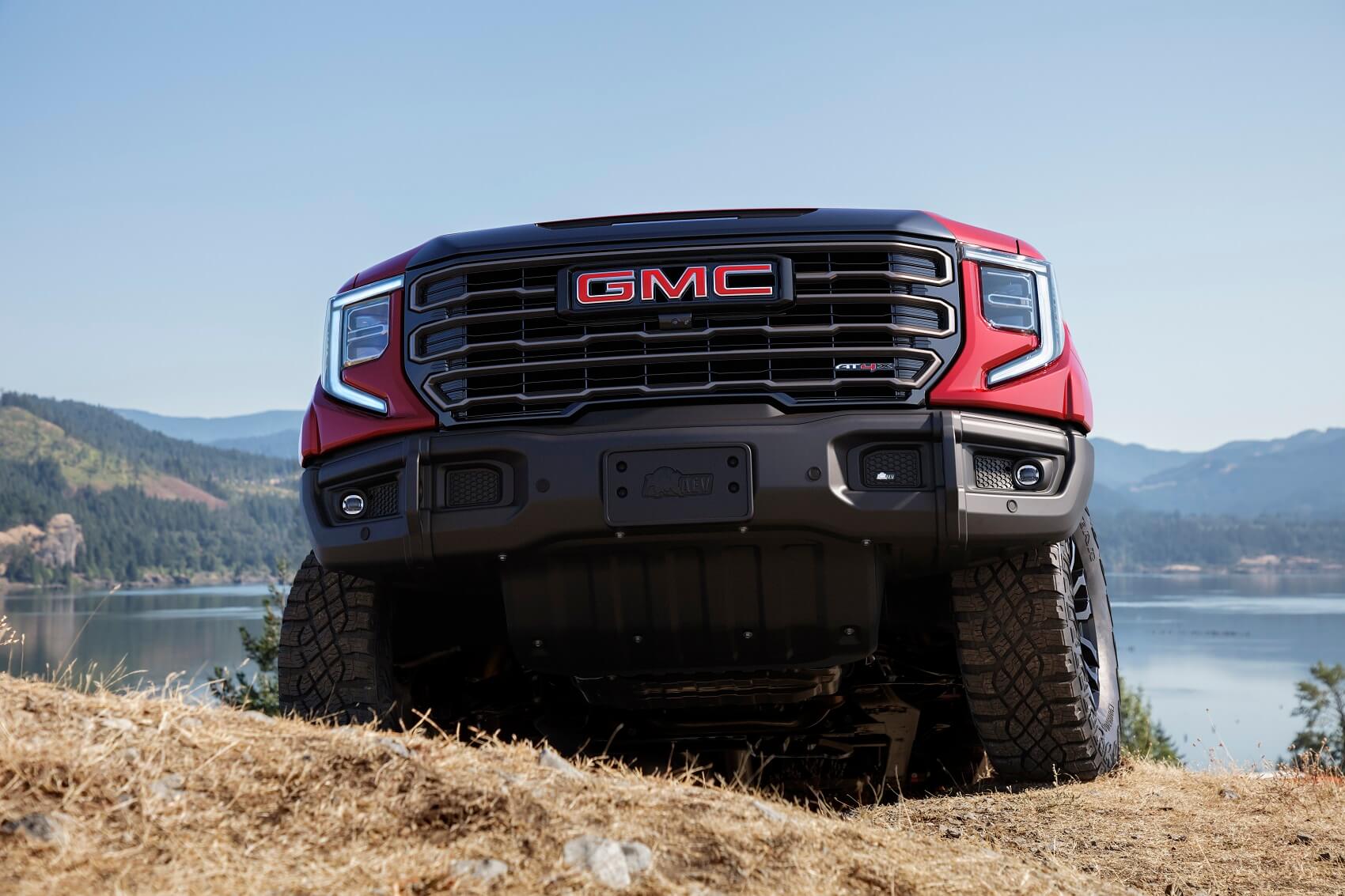 New GMC Truck Off-Roading Near a Lake