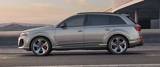 Silver Audi SUV parked outdoors, side profile