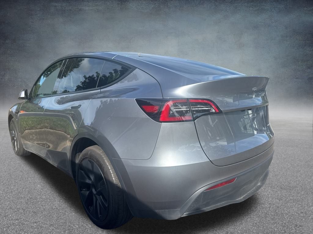 Used 2024 Tesla Model Y Long Range with VIN 7SAYGDEEXRA322122 for sale in Northfield, Minnesota