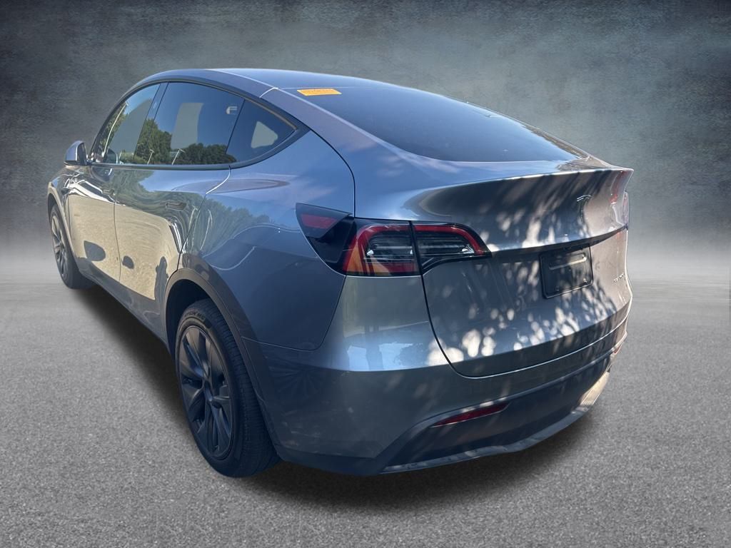 Used 2025 Tesla Model Y Long Range with VIN 7SAYGDEE1SA371635 for sale in Northfield, Minnesota