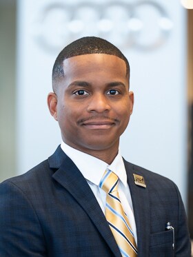 Staff member Simuel Larry from a493f56063c3