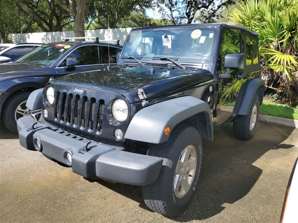 Used 2014 Jeep Wrangler Sport with VIN 1C4AJWAG9EL314266 for sale in Coral Springs, FL