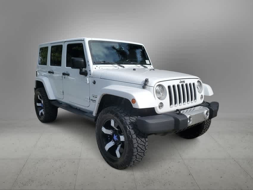 Used 2017 Jeep Wrangler Unlimited Sahara with VIN 1C4BJWEG5HL678610 for sale in Coral Springs, FL
