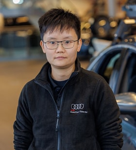 Staff member Chris Deng from 4a28b31dd69b