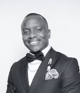 Staff member Chris Okello from 2088c9277e59