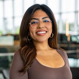 Staff member Adeline Lopez from 6d87df4e2edc
