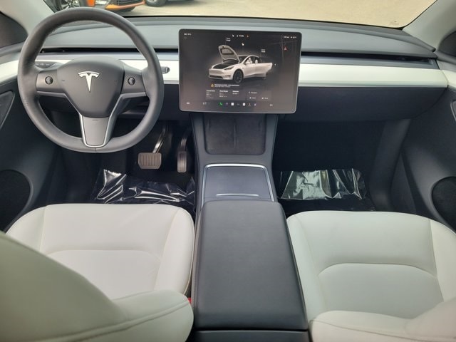 Used 2023 Tesla Model Y Long Range with VIN 7SAYGAEE8PF646670 for sale in Kansas City