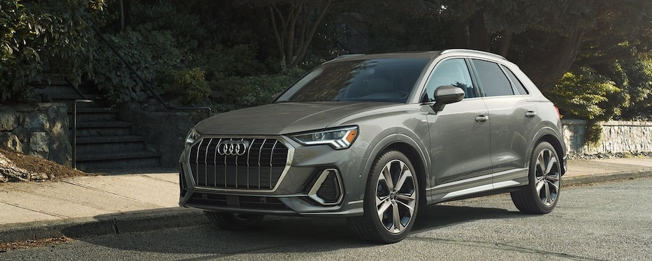 Audi Q3 driving on a highway