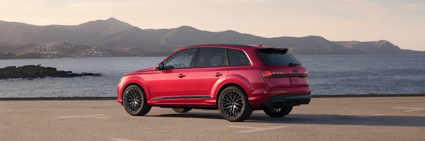 Audi SQ7 driving away in the desert at dusk