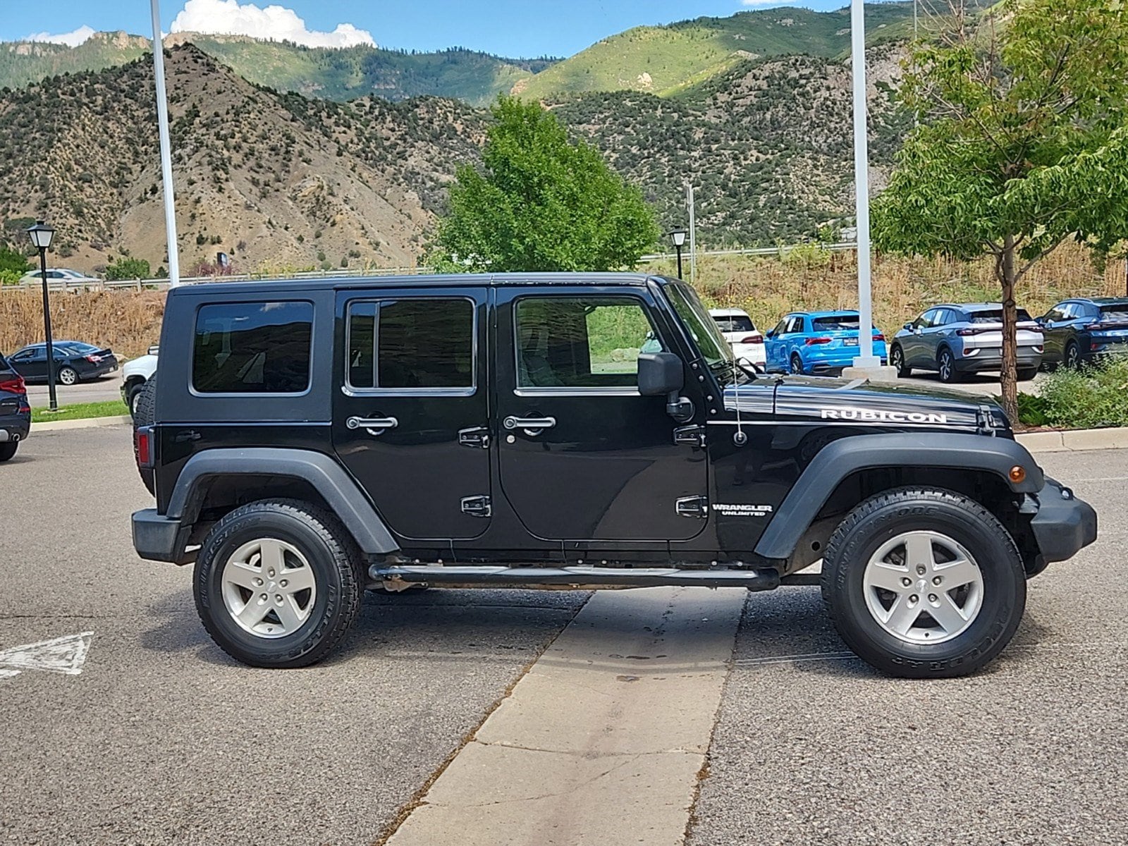 Used 2007 Jeep Wrangler Unlimited Rubicon with VIN 1J4GA69177L100285 for sale in Glenwood Springs, CO