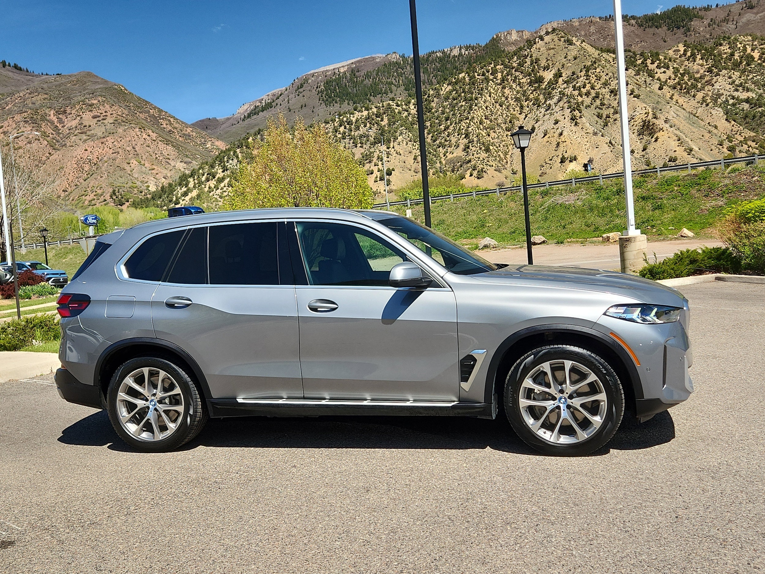 Used 2024 BMW X5 50e with VIN 5UX43EU00R9U24477 for sale in Glenwood Springs, CO