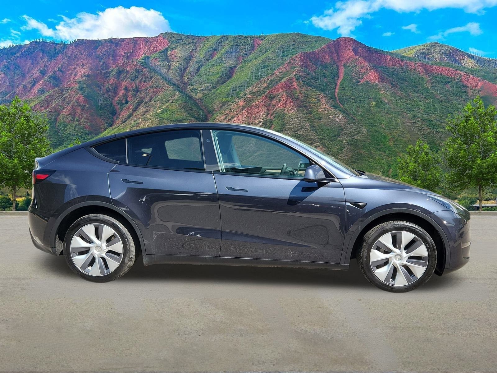 Used 2024 Tesla Model Y Long Range with VIN 7SAYGDEE2RA264927 for sale in Glenwood Springs, CO
