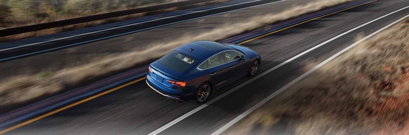 Blue 2021 Audi A5 on highway
