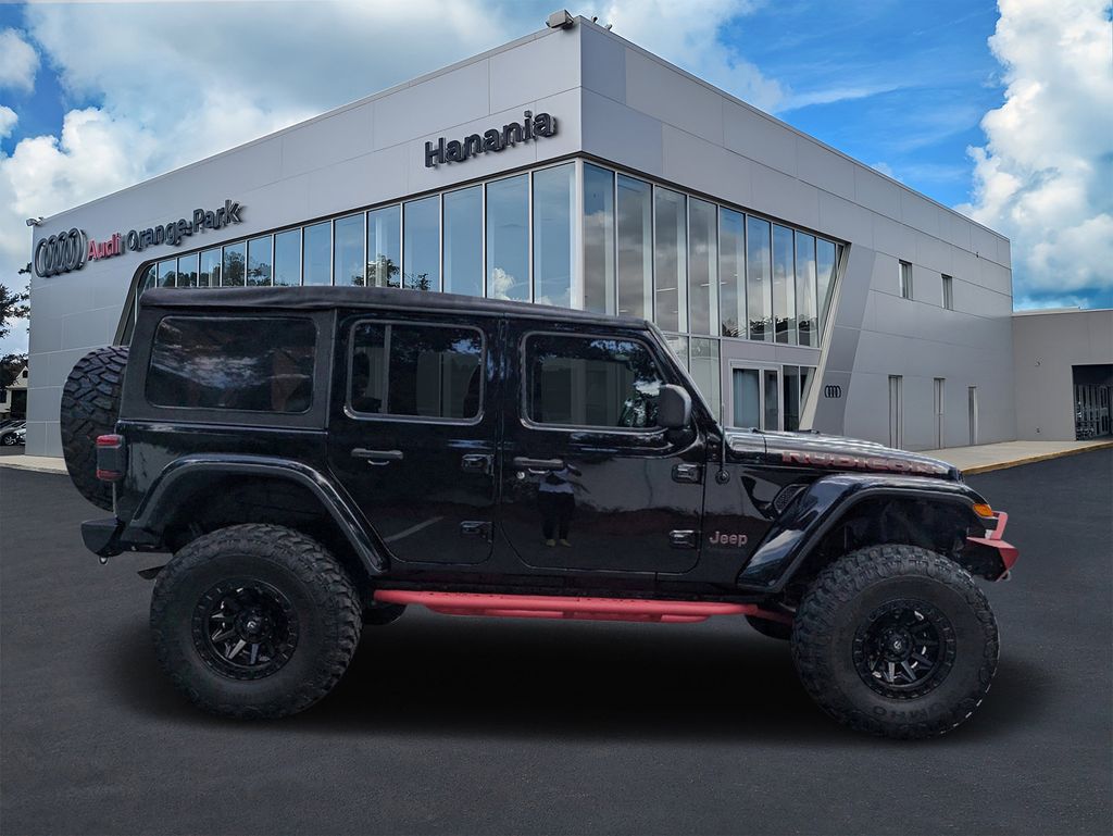 Used 2021 Jeep Wrangler Unlimited Rubicon with VIN 1C4JJXFM8MW605911 for sale in Jacksonville, FL