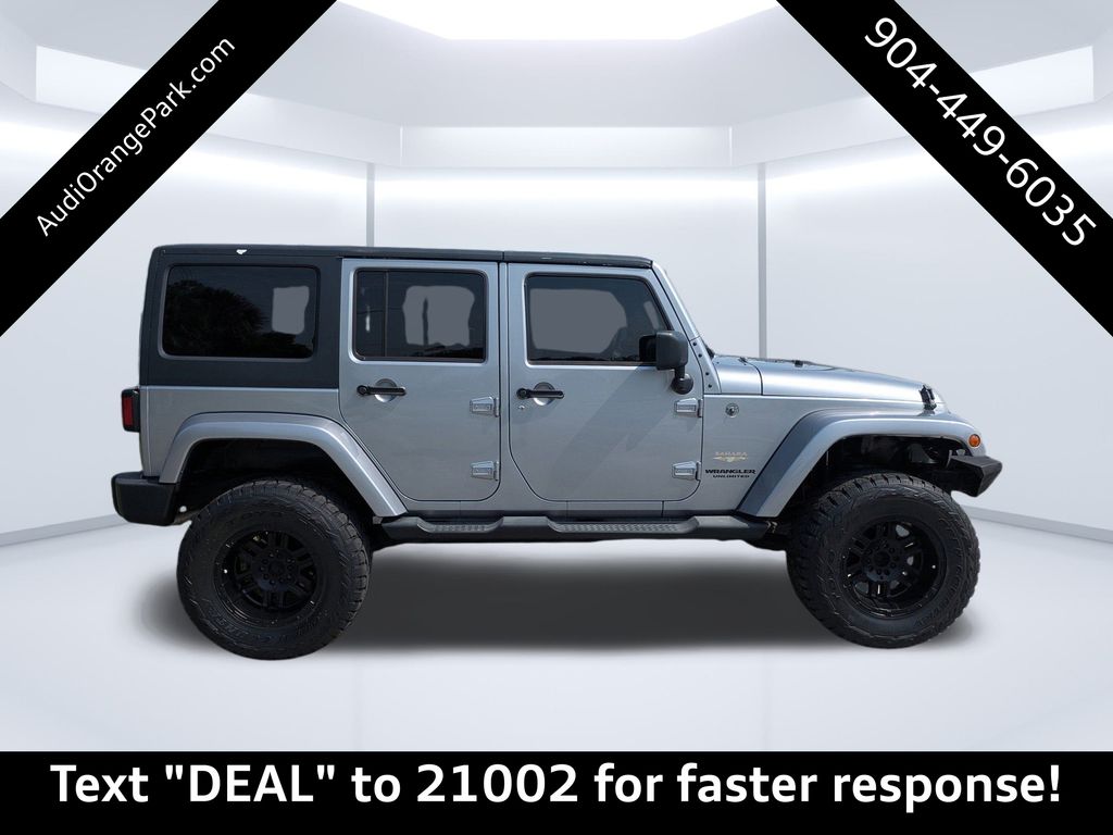 Used 2013 Jeep Wrangler Unlimited Sahara with VIN 1C4HJWEG4DL562772 for sale in Jacksonville, FL
