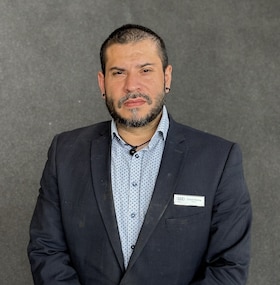 Staff member Carlyle Brenna from ID_d794820fac83