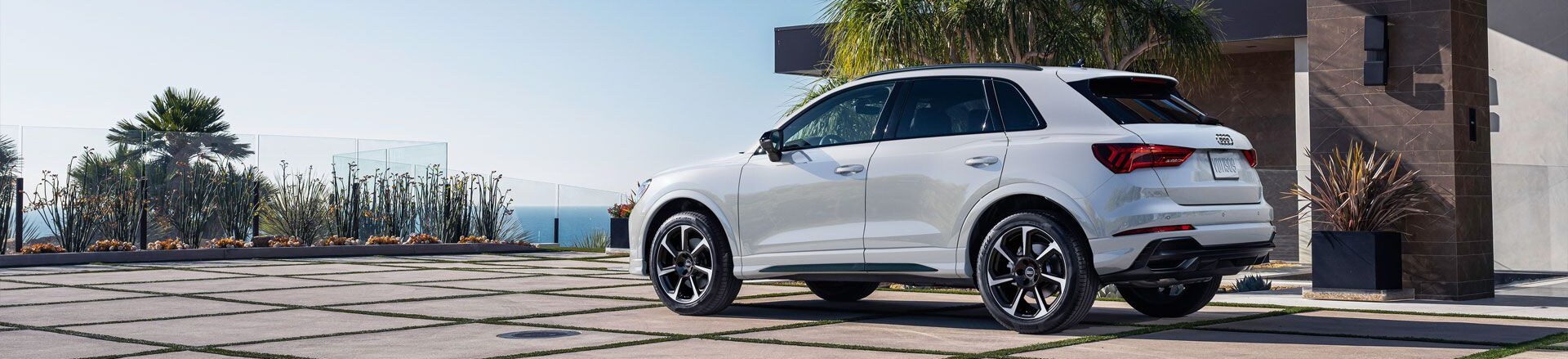 1920x1080-D1-MY25-Q3-Exterior-Rear-Profile-Parked-5718-1920x439.jpg
