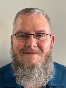 Staff member John Thompson from ID_d907fb2e72e5