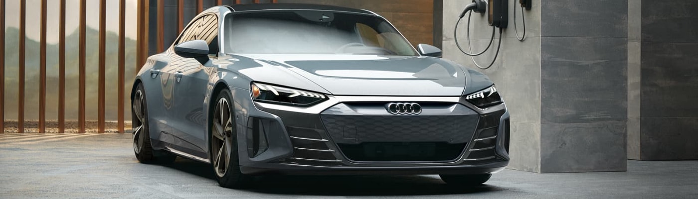 Audi e-tron GT Audi e-tron GT near a charging port