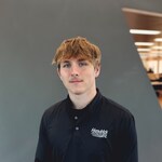 Staff member Sam Dorokhov from ID_69aae46b64f3