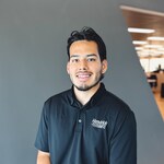 Staff member Carlos Hernandez from ID_69aae46b64f3