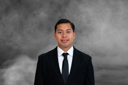 Staff member Anthony Canche from ID_c577a28b3f57