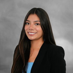 Staff member Litsy Marquez from ID_c577a28b3f57