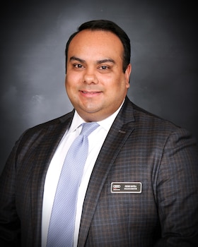 Staff member Pedro Davila from 27db7ecfd894
