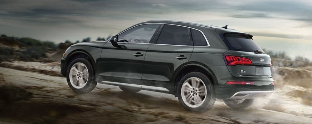 2020 Audi Q5 driving on dirt road