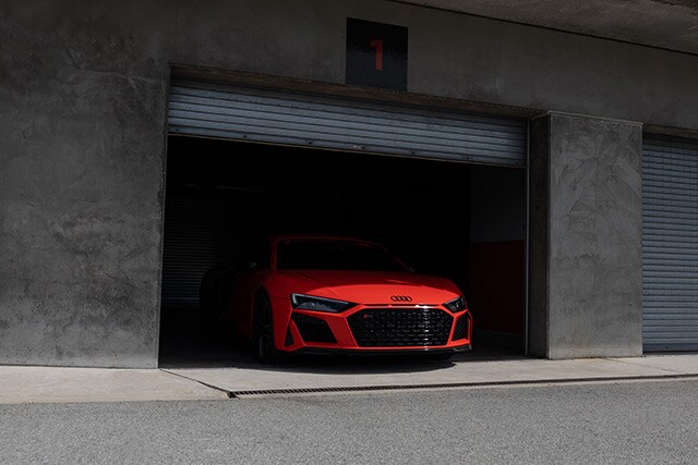 11780-AudiR8takeslastlapsatMontereyCarWeek.jpg